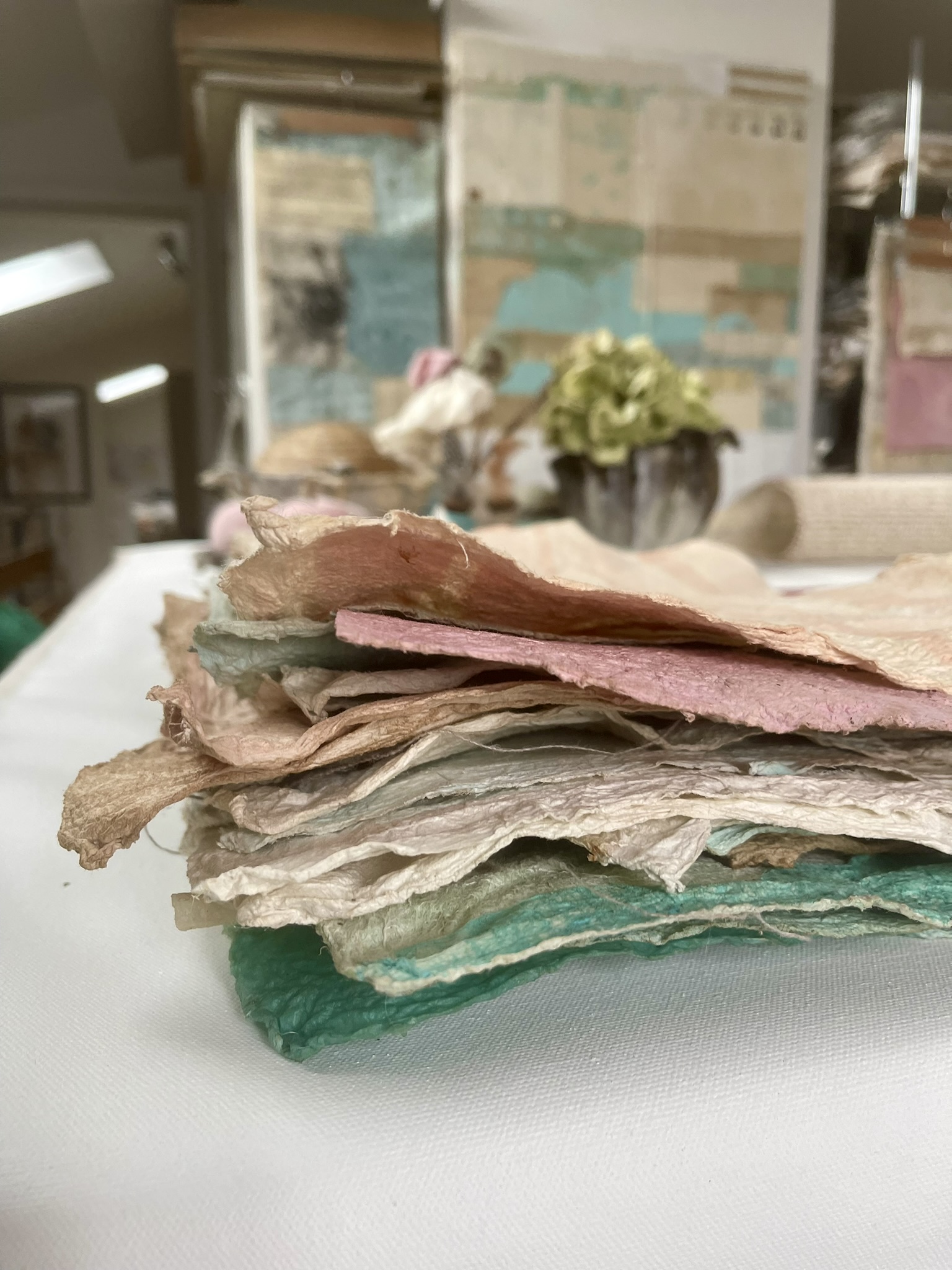 Close up of textured Joomchi paper showing organic fibers and artistic layering